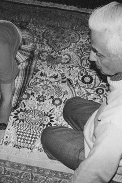 Mr. Talwar overlooking Colleen sign her new silk rug to be shipped to her hometown in NY(1991)