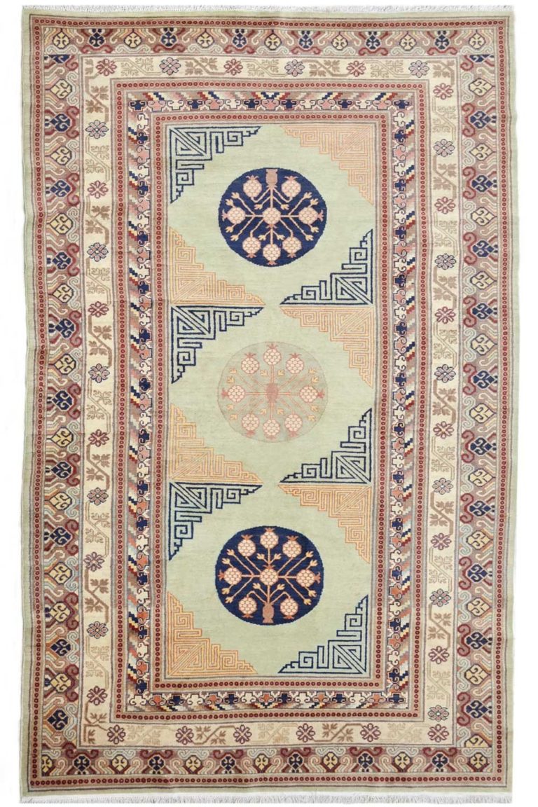 Shop a Antique Maroon Rug with Bold Motifs and Bright