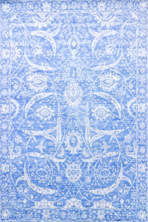 Classic Oushak design with intricate floral patterns in soft blue and ivory. Hand-knotted from premium wool for durability and comfort.