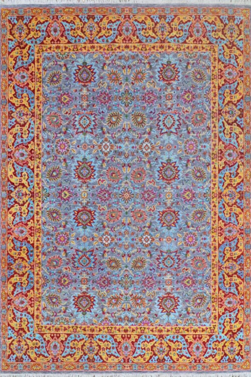 This is a modern colourway of a Handknotted Persian Heriz Carpet. This colourful border with vivid geometric and floral starburst patterns recall traditional Persian Heriz carpets, but with more vivid colours.