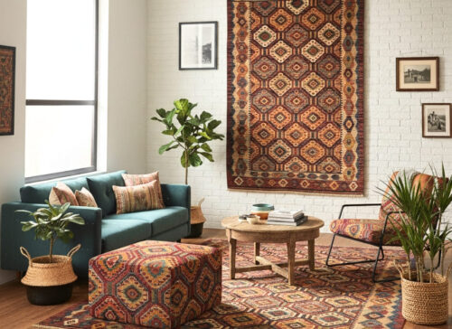 To be bold and elegant, you can upholster the furniture, such as benches, ottomans, or chair cushions, with Kilims. The complex designs of Kilims give modern furniture a character and an artistic touch. This combination of ancient craft and modern architecture adds an eclectic atmosphere to any room at a glance. The ideal feature that can be used to unify your space is a Kilim-upholstered ottoman or accent chair in the collection of the Yak Carpet.