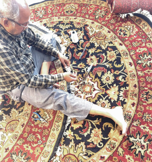 Yak Carpet handknotted craftsmanship detail showing intricate Kashan pattern and fine weaving by skilled artisans in India